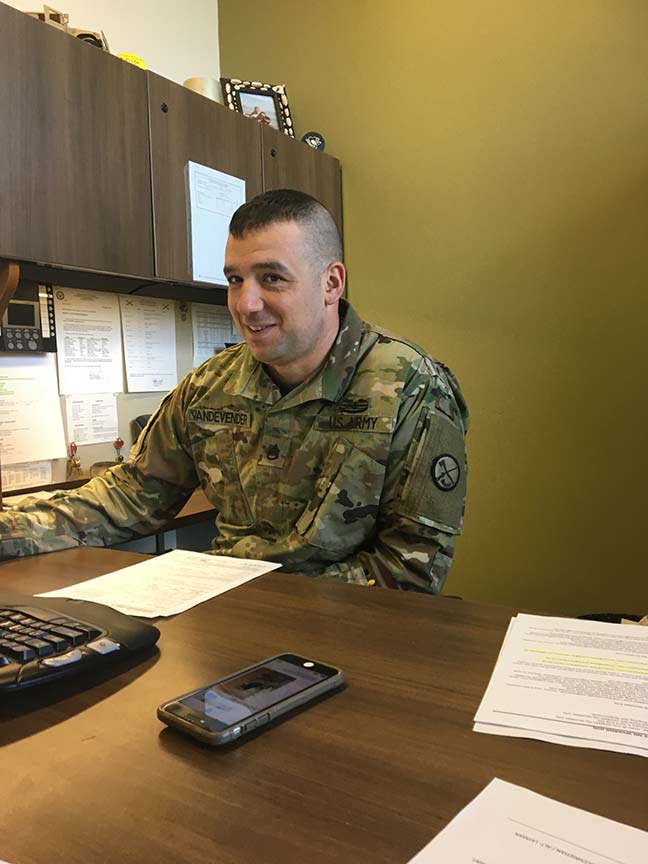 recruiter sitting at a desk